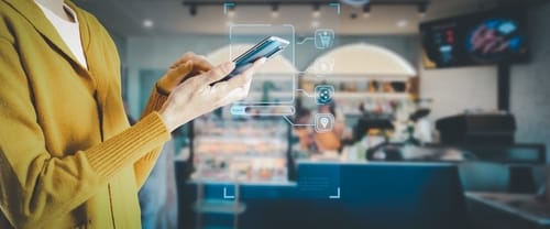 A luxury real estate agent reviewing digital marketing tools used to promote high-end properties