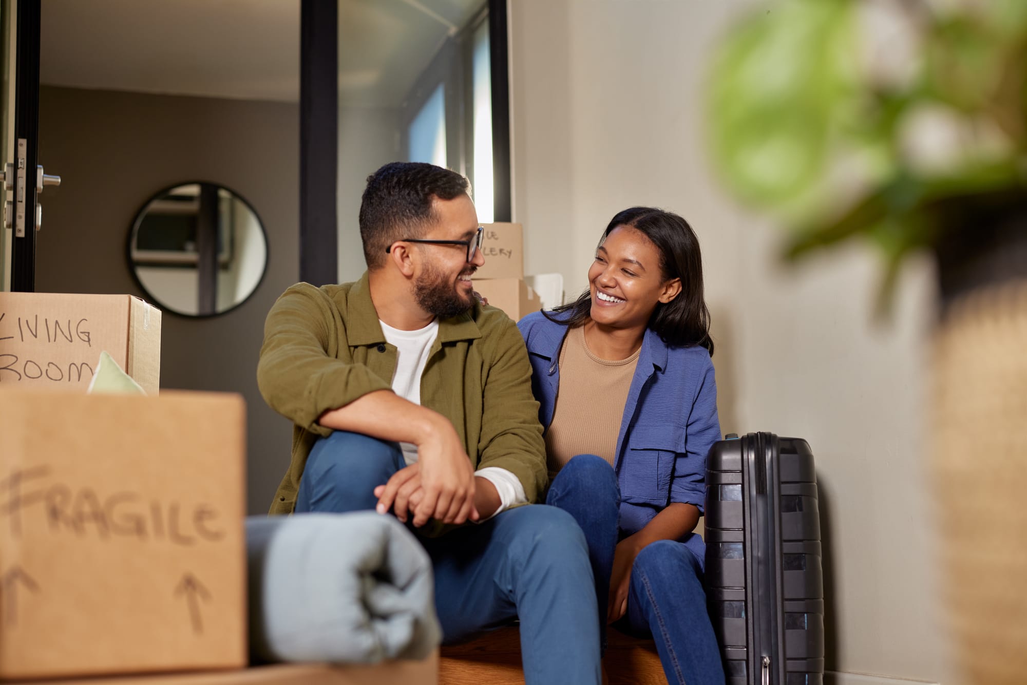 A first-time home buyer couple preparing to move to a new home